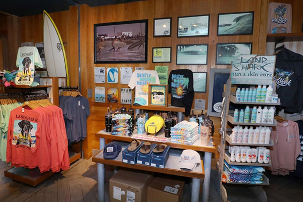 store for landshark sunblock hats flipflops