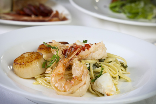 pasta and seafood dish with shrimp and scallops